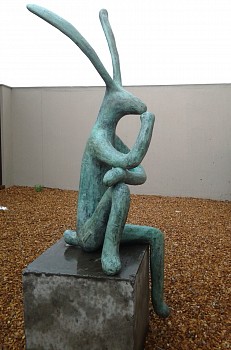 Hare sitting on a wall